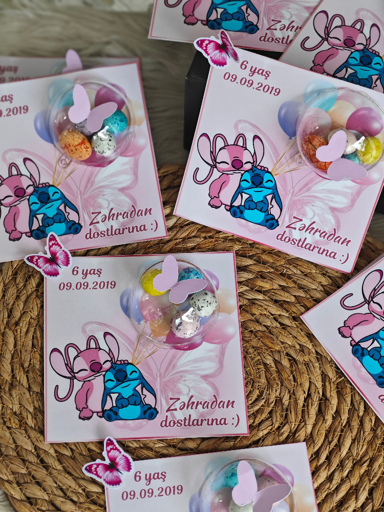 Sticker with cartoon characters and text on a woven surface