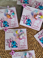 Sticker with cartoon characters and text on a woven surface