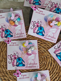 Sticker with cartoon characters and text on a woven surface