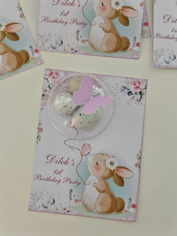 Children's birthday party invitations with bunny designs on a light background