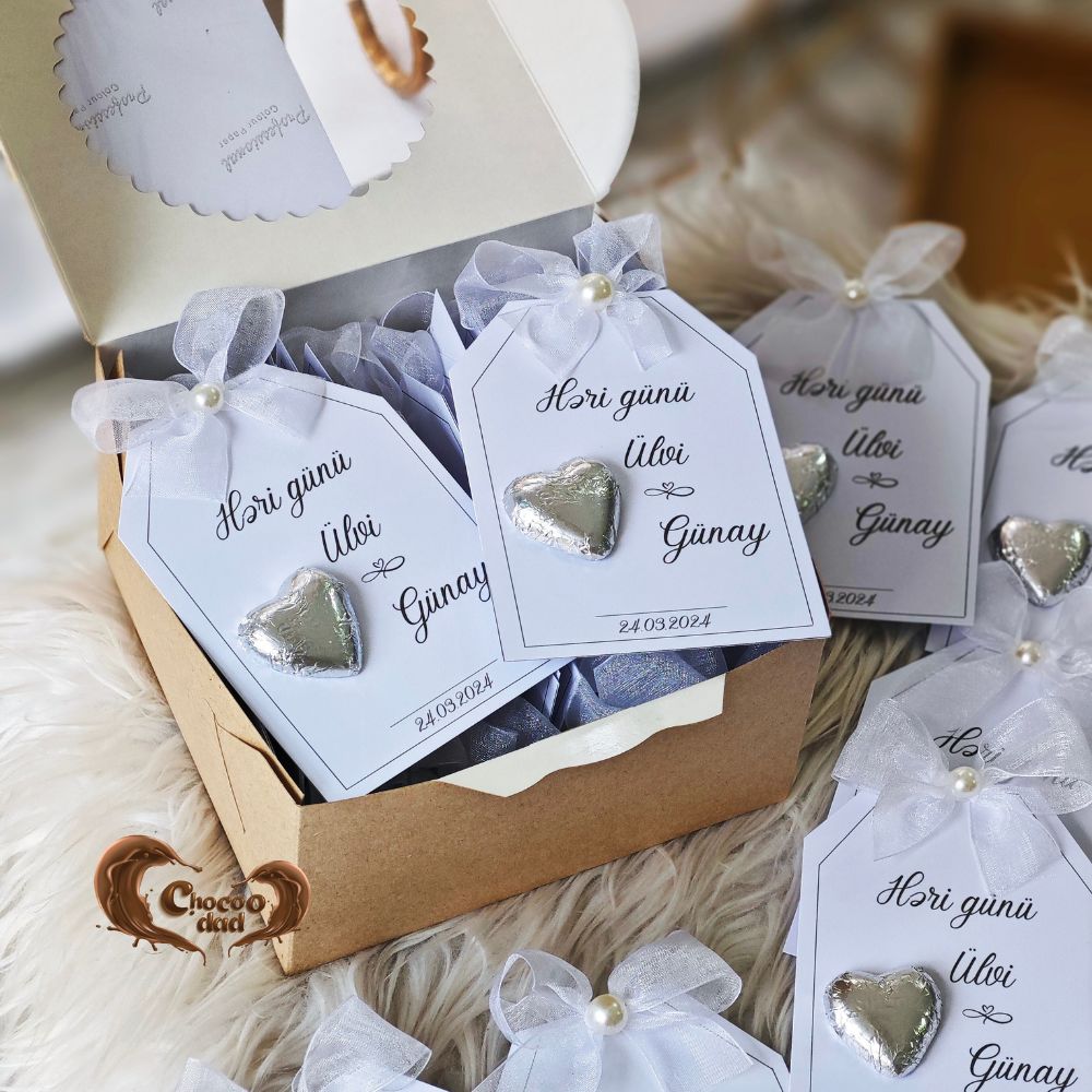 Make your "Yes Day" truly memorable with our beautifully crafted chocolate cards. Designed with a sophisticated silver and white color palette, these cards are the perfect addition to your parent blessing ceremony or engagement day.