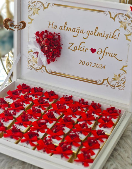 Həri gününə özəl qırmızı qızılgül buketli 24 ədədlik şokolad qutusu