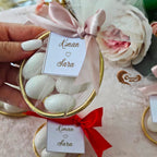 engagement with our elegant ring-shaped chocolate favors! 🍫✨ Available in two versions, featuring 3 or 5 delicious chocolate dragees, each treat is beautifully adorned in golden rings for a luxurious touch