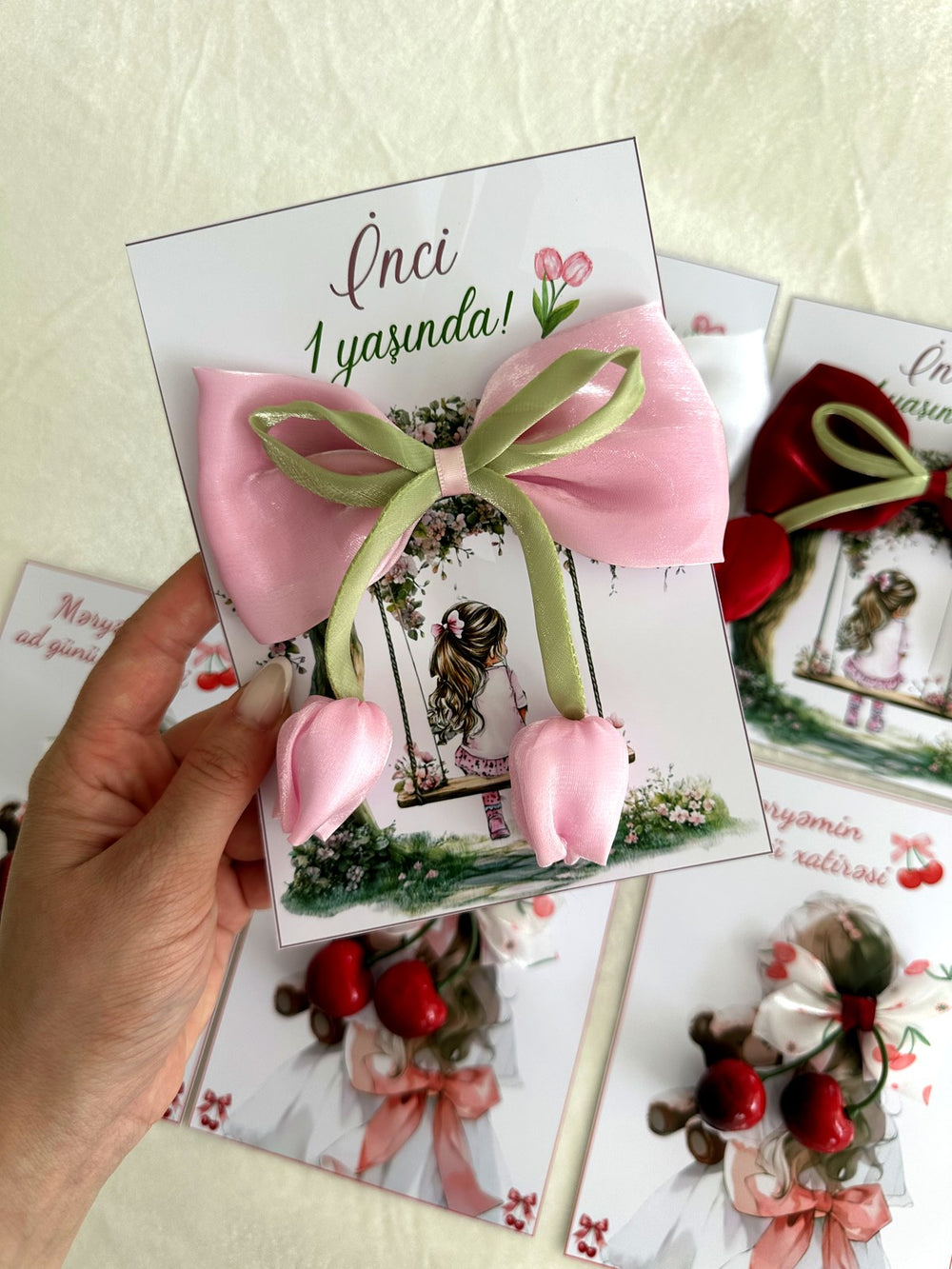Girl on a Swing 1st Birthday Favor Cards with Multicolour Tulip Hair Clip — Chocodad Baku