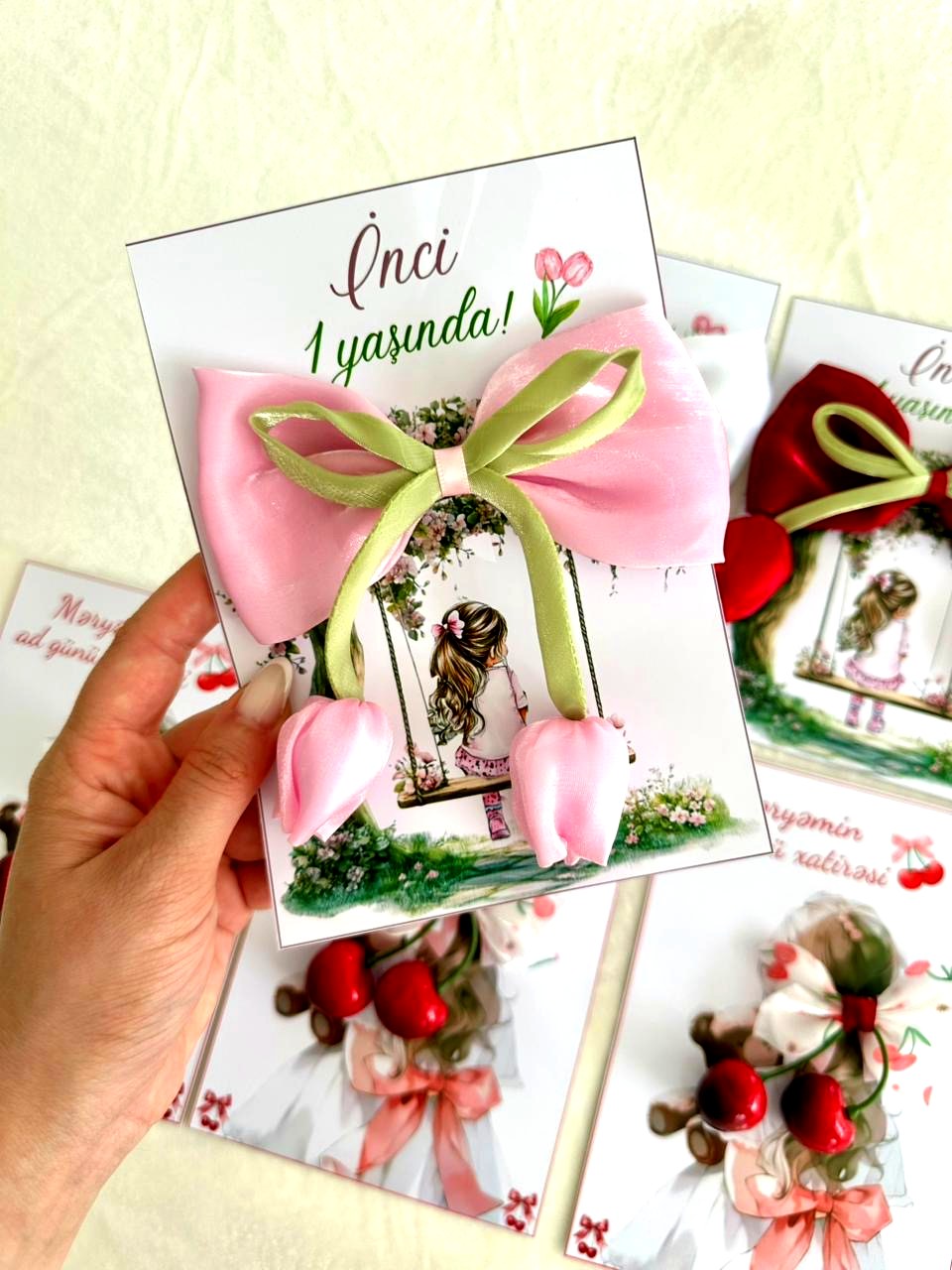Girl on a Swing 1st Birthday Favor Cards with Multicolour Tulip Hair Clip — Chocodad Baku