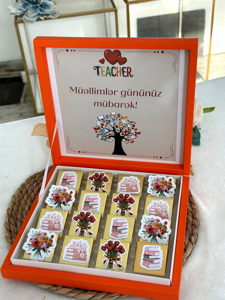 Narıncı Müəllimlər Günü hədiyyə qutusu – kitab və buket şokoladları