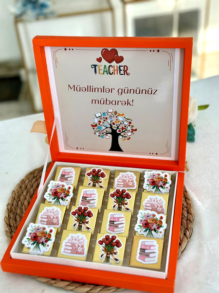 Narıncı Müəllimlər Günü hədiyyə qutusu – kitab və buket şokoladları