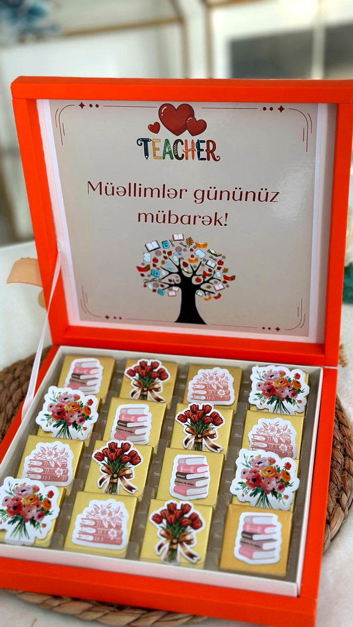 Narıncı Müəllimlər Günü hədiyyə qutusu – kitab və buket şokoladları